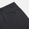 View 3 of product Turnbull & Asser Charcoal Houndstooth Flannel Trousers with a straight-leg cut, front zipper, button closure, belt loops, and side pockets, shown laid flat on a white background.