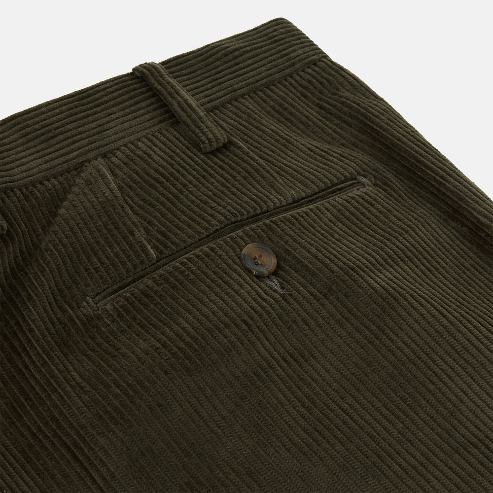 Turnbull & Asser's Olive Green Corduroy Trousers feature a straight leg, front button and zip closure, belt loops, and pressed creases—an essential piece for any men's wardrobe, shown against a white background.