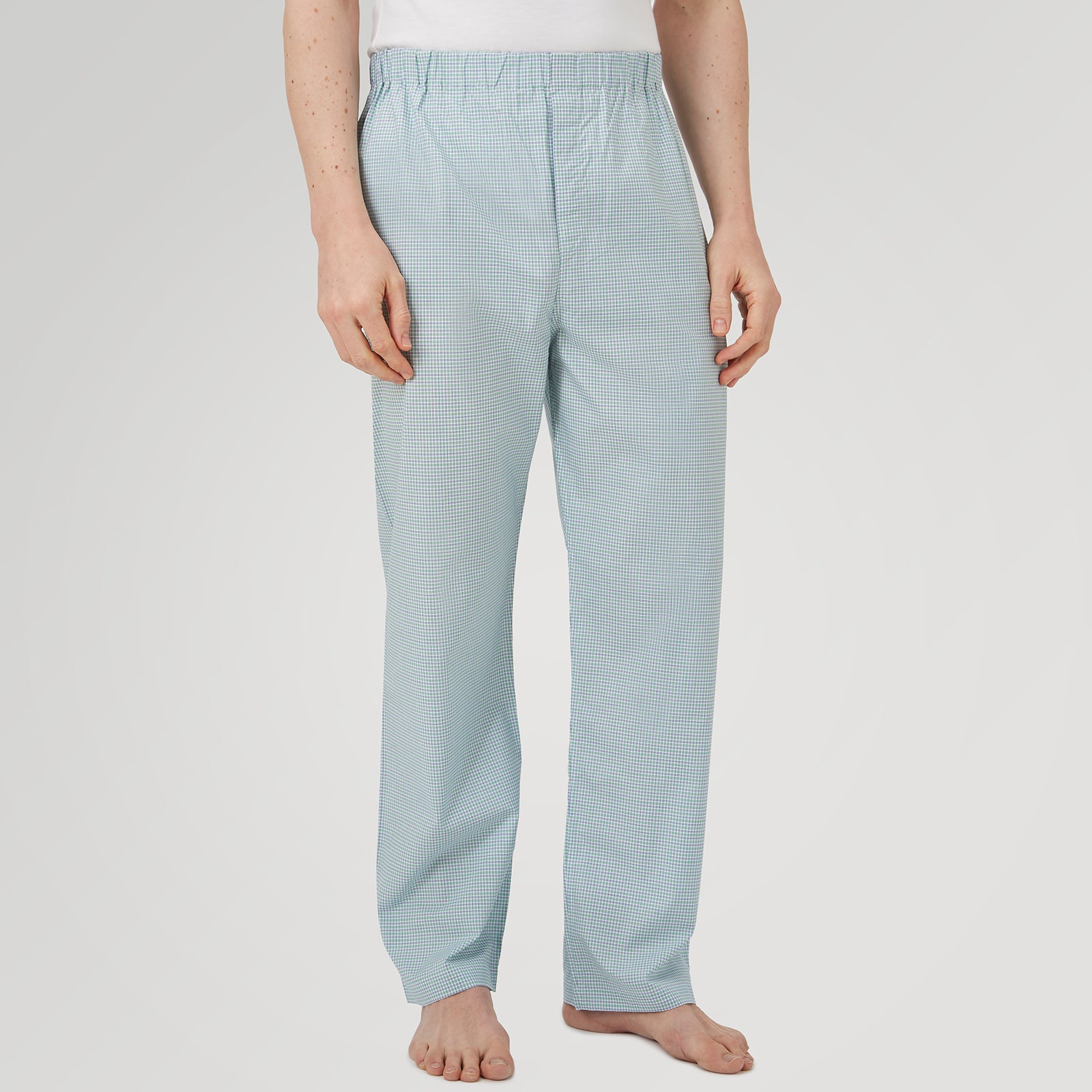 View 2 of product Kelly Green Check Modern Pyjama Trousers by Turnbull & Asser, crafted from superfine cotton with an elastic waistband for a modern look, shown against a plain white background.