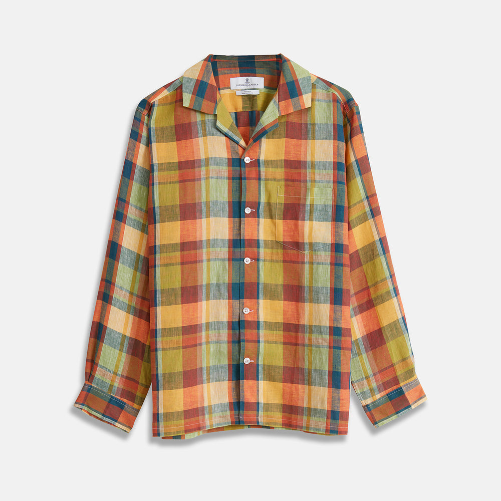 Turnbull & Asser's Orange Madras Check Holiday Fit Long Sleeve Linen Shirt features a bold plaid in orange, yellow, green, and blue with a revere collar and 1-button cuff—ideal for effortless holiday style. Laid flat on white background.