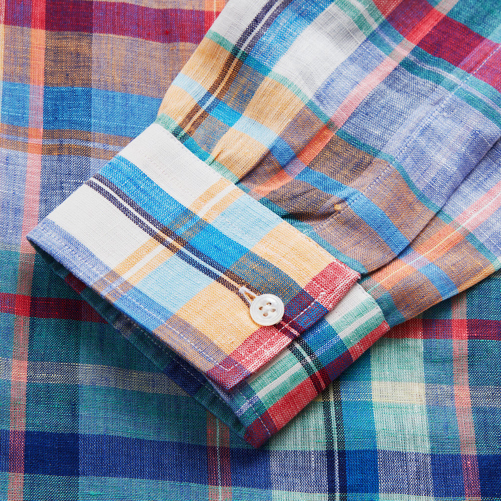 The Turnbull & Asser Red and Teal Madras Check Weekend Fit Linen Shirt features a stand collar, 1-button cuff, and colorful plaid pattern, shown against a white background.