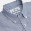 View 2 of product Turnbull & Asser’s Indigo Chambray Stripe Weekend Fit Shirt with Dorset collar features thin white pinstripes, two button-flap chest pockets, buttoned cuffs, and relaxed styling—presented flat on a white background.
