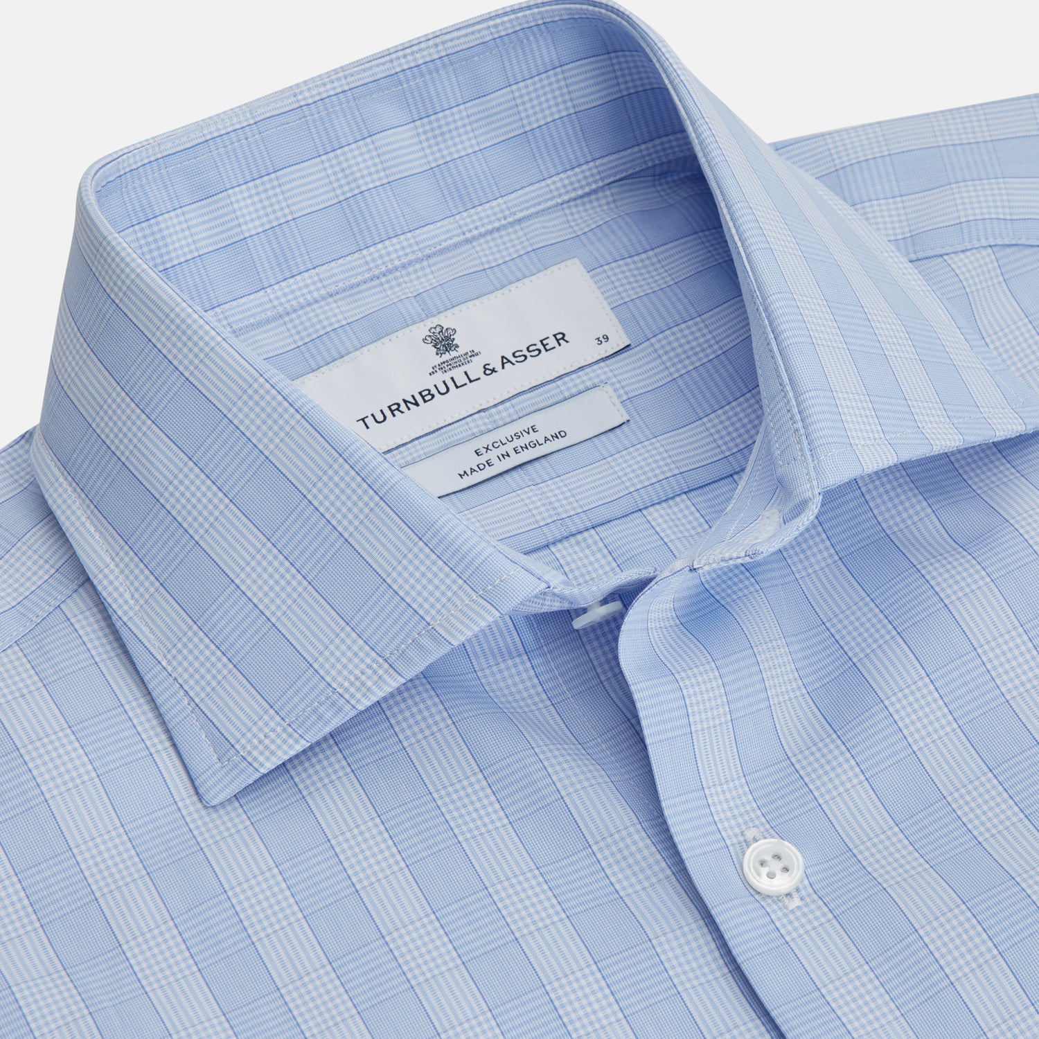 View 2 of product The Tonal Blue Glen Check Tailored Fit Shirt by Turnbull & Asser features a Kent collar and white buttons, crafted from fine Italian cotton poplin for a refined look. Displayed flat on a white background.