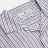 View 3 of product The Turnbull & Asser Blue and Red Linen Stripe Holiday Fit Shirt features a revere collar, relaxed fit, and short sleeves—perfect resort wear with vertical blue, white, and light red stripes.