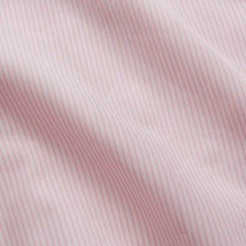 The Pink Fine Stripe Regular Fit Shirt with T&A Collar by Turnbull & Asser is a light pink, long-sleeve poplin shirt made from Italian cotton, featuring white buttons and shown flat on a white background.
