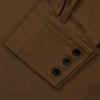 View 3 of product The Turnbull & Asser Khaki Cotton Weekend Fit Western Shirt features a Dorset collar, long sleeves, two button-flap chest pockets, and buttoned cuffs—an essential smart-casual piece shown against a white background.