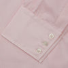 View 4 of product The Pink Fine Stripe Regular Fit Shirt with T&A Collar by Turnbull & Asser is a light pink, long-sleeve poplin shirt made from Italian cotton, featuring white buttons and shown flat on a white background.