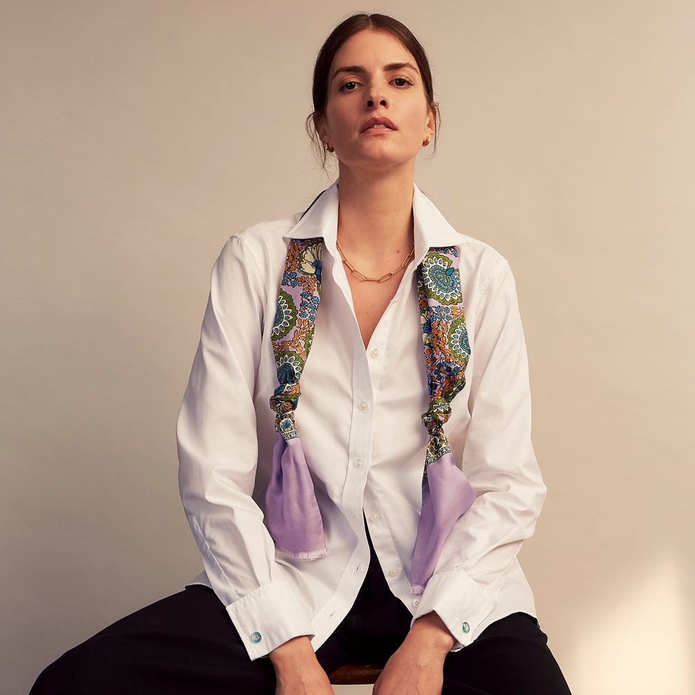The Turnbull and The Deck White Cotton Traditionalist Shirt by Turnbull & Asser features a classic collar, buttoned front and cuffs, and a refined Royal Oxford weave, shown on a plain light gray background.