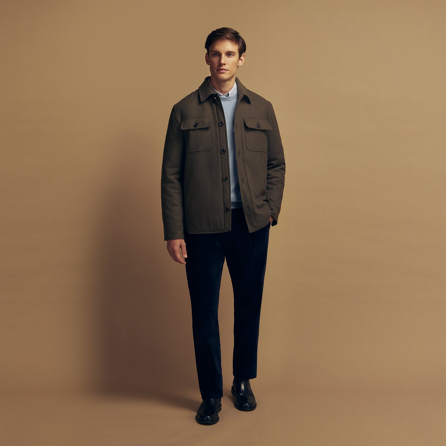 View 2 of product The Green Quilted Cashmere Amhurst Overshirt by Turnbull & Asser features a collar, long sleeves, button-flap chest pockets, and thermo-regulating graphene wadding. Displayed on a plain white background.