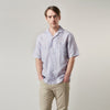 View 5 of product The Turnbull & Asser Blue and Red Linen Stripe Holiday Fit Shirt features a revere collar, relaxed fit, and short sleeves—perfect resort wear with vertical blue, white, and light red stripes.