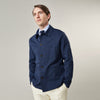 View 4 of product The Turnbull & Asser Navy Cotton-Linen Remy Chore Jacket features a collar, long sleeves, button closure, and three front pockets—a versatile minimalist essential for any men's wardrobe, shown laid flat on a white background.