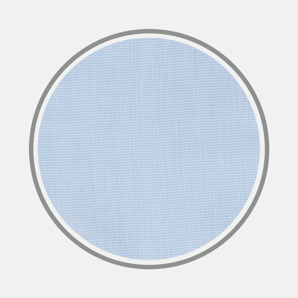 A circular piece of Turnbull & Asser Light Blue End-on-End Cotton Fabric with a light gray border is shown against a plain white background.