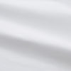 View 4 of product The Turnbull & Asser White Piped Cotton Nightshirt features black piping on the collar, chest pocket, and cuffs, plus a curved hem and loose-fitting sleeves gathered at the wrists for a classic look.