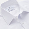 View 2 of product The Turnbull & Asser White Organic Cotton Regular Fit Mayfair Shirt features long sleeves, a classic collar, and button-down front, shown laid flat against a white background.