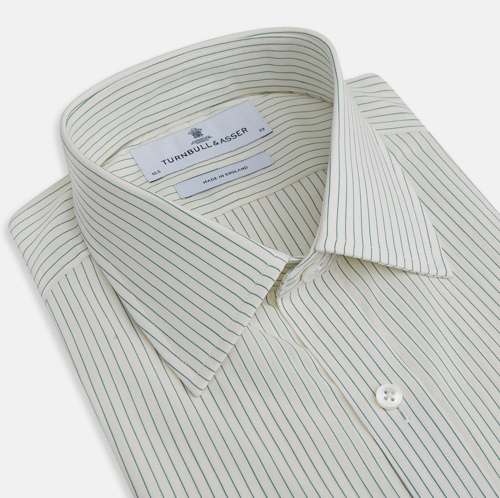 The Turnbull & Asser Dark Green Pinstripe Mayfair Shirt is a long-sleeve, button-up with a classic collar, crafted from organic cotton and featuring thin vertical white and dark green stripes, shown flat on a white background.