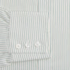 View 3 of product The Turnbull & Asser Dark Green Pinstripe Mayfair Shirt is a long-sleeve, button-up with a classic collar, crafted from organic cotton and featuring thin vertical white and dark green stripes, shown flat on a white background.