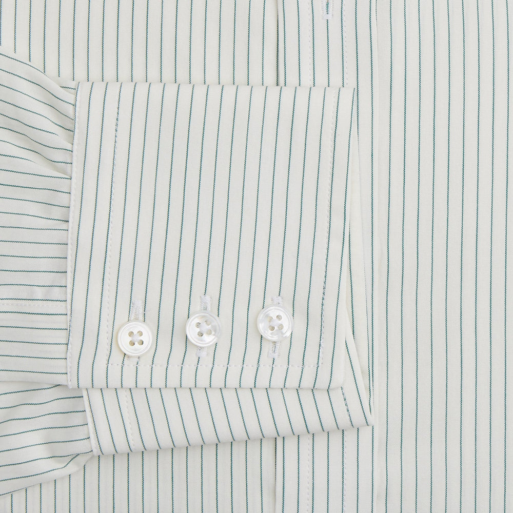 The Turnbull & Asser Dark Green Pinstripe Mayfair Shirt is a long-sleeve, button-up with a classic collar, crafted from organic cotton and featuring thin vertical white and dark green stripes, shown flat on a white background.