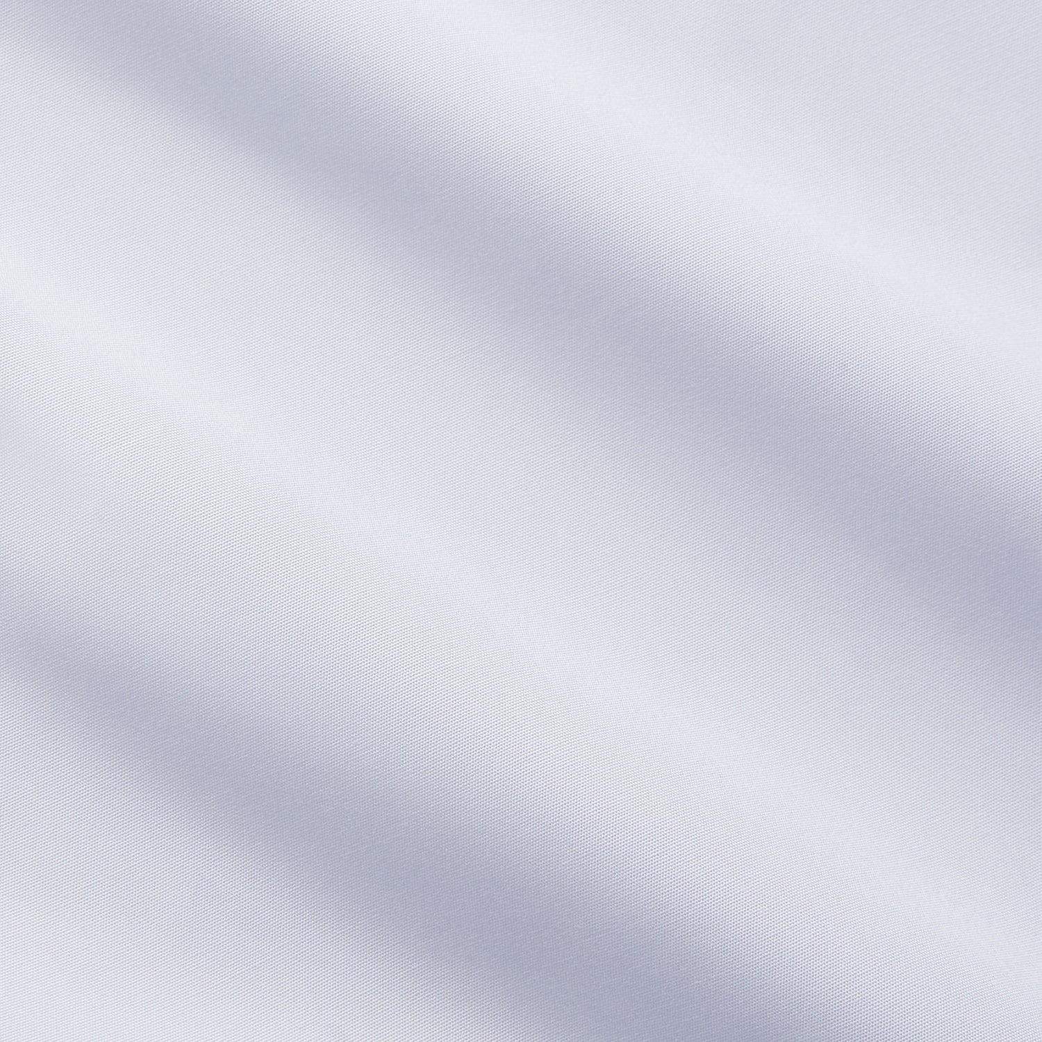 View 4 of product The Turnbull & Asser White Organic Cotton Tailored Fit Hove Shirt is a classic long-sleeve dress shirt with a button-down front and collar, crafted from soft organic cotton and shown on a white background.