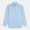 View 1 of product The Turnbull & Asser Pale Blue Organic Cotton Tailored Fit Hove Shirt is a formal long-sleeve button-up with a classic collar and white buttons, crafted from premium organic cotton and shown on a plain white background.