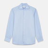 View 1 of product The Turnbull & Asser Tailored Fit Blue Cotton Shirt features a Kent collar and double cuffs, laid flat on a white background—ideal for pairing with a navy suit or any smart look.