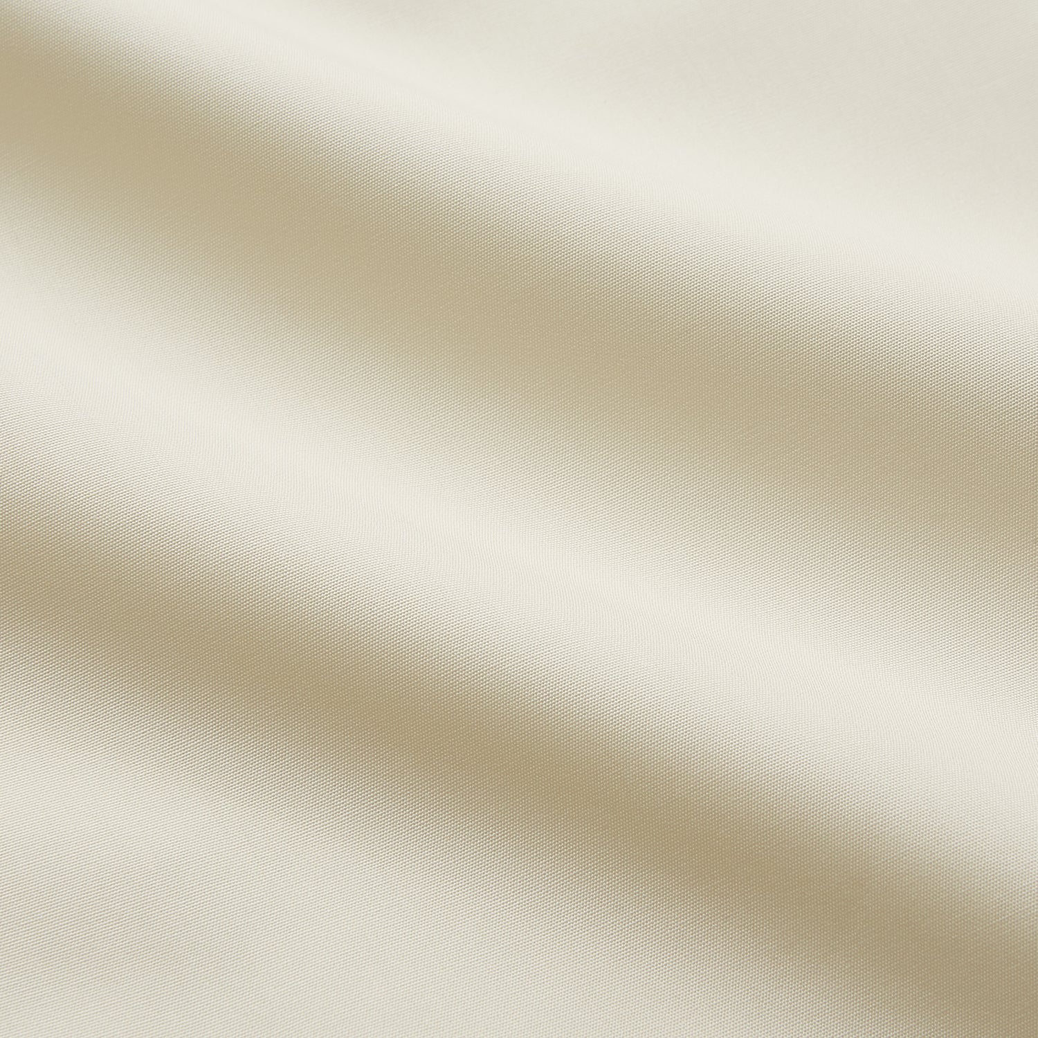 View 4 of product The Turnbull & Asser Tailored Fit Cream Cotton Shirt features a Kent collar and double cuffs, shown laid flat against a white background—ideal for pairing with statement ties.