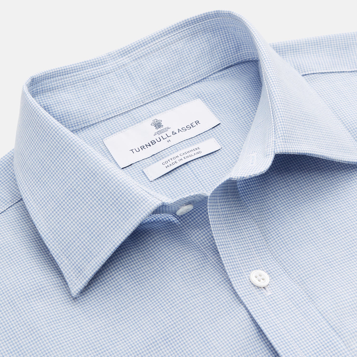 View 2 of product The Blue Weekend Fit Cotton-Cashmere Finch Shirt by Turnbull & Asser features a derby collar, chest pocket, and long sleeves—ideal for casual style from the Weekend Fit collection. Laid flat on white; comfortable and refined.