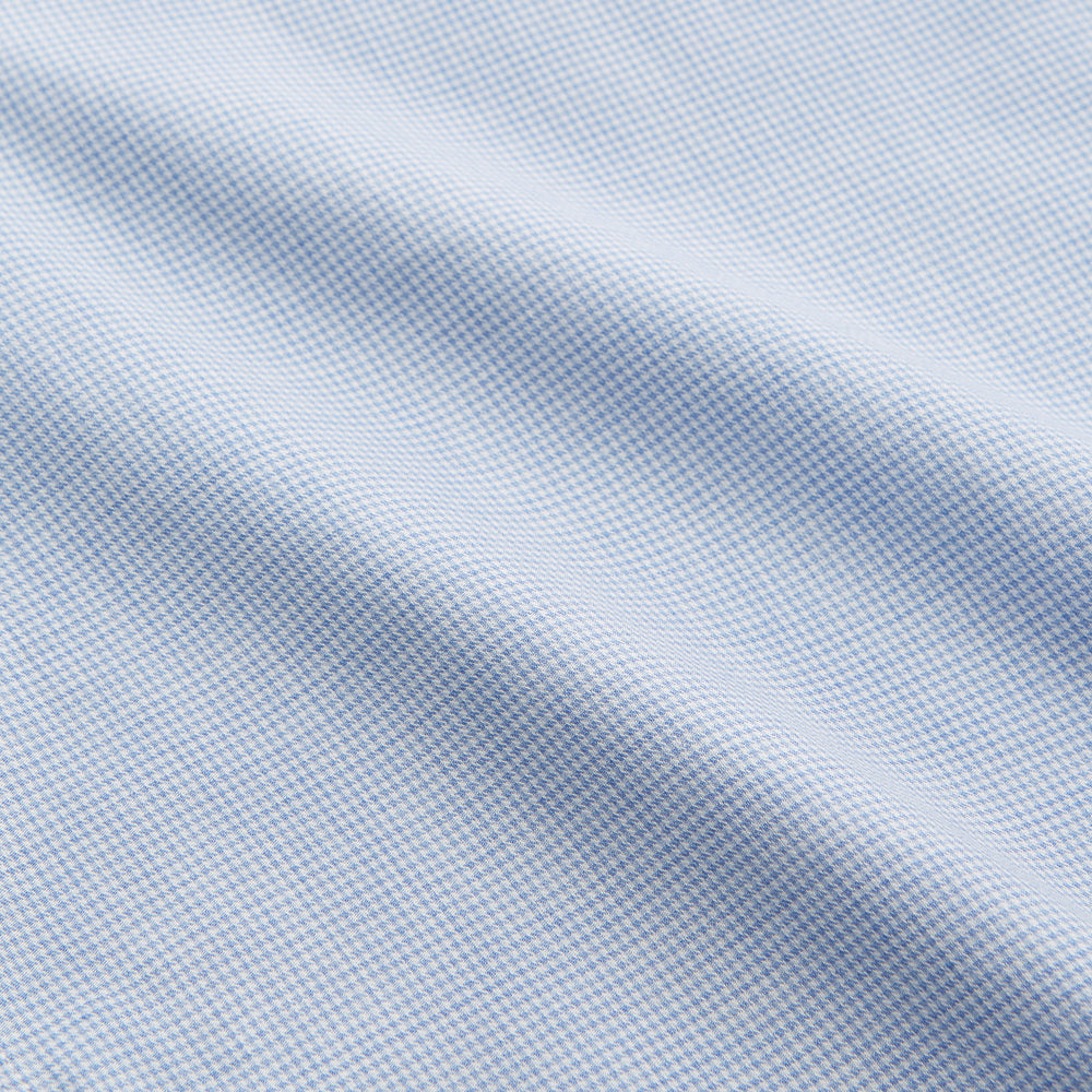 The Blue Weekend Fit Cotton-Cashmere Finch Shirt by Turnbull & Asser features a derby collar, chest pocket, and long sleeves—ideal for casual style from the Weekend Fit collection. Laid flat on white; comfortable and refined.