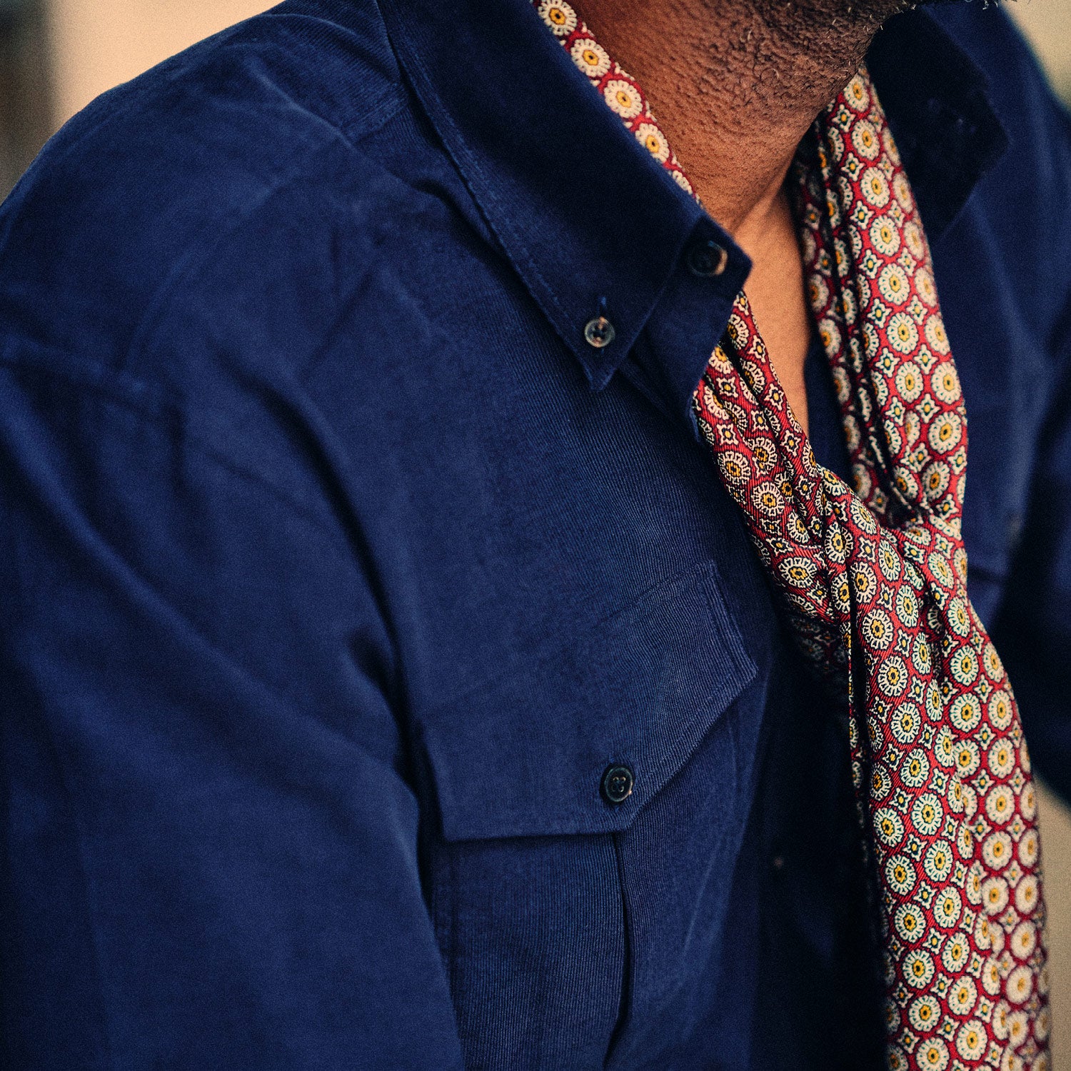 View 3 of product The Turnbull & Asser Midnight Blue Corduroy Officer Weekend Fit Shirt features a soft Dorset collar, relaxed fit, 1-button cuffs, and two button-flap chest pockets, shown on a white background.