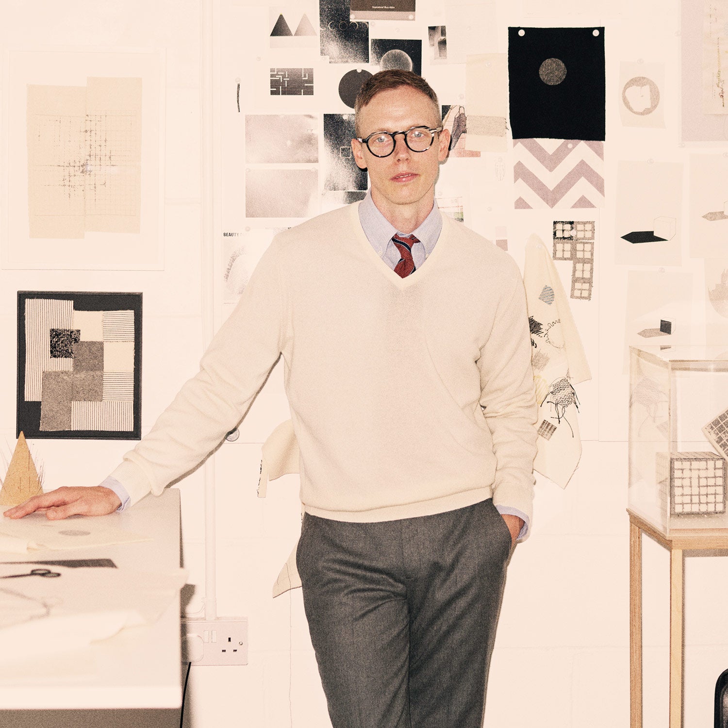 View 2 of product The Grey Fox Flannel Trousers by Turnbull & Asser are tailored in a straight-leg fit from soft wool flannel by Fox Brothers, featuring belt loops and side pockets, shown flat on a white background.