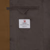 View 4 of product The Turnbull & Asser Tobacco Plainweave Cashmere Jacket is a single-breasted brown summer jacket with two buttons, notch lapels, and flap pockets, tailored in Italy and shown on a plain white background.