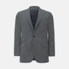 View 1 of product The Turnbull & Asser Grey Prince of Wales Check Wool Hopsack Jacket features a notched lapel, two-button closure, two front flap pockets, and a chest pocket, shown on a plain white background.