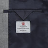 View 2 of product The Dove Grey Escorial Lightweight Wool Jacket by Turnbull & Asser features soft Escorial wool, a notched lapel, two front buttons, three pockets, and a single chest pocket, shown against a plain white background.