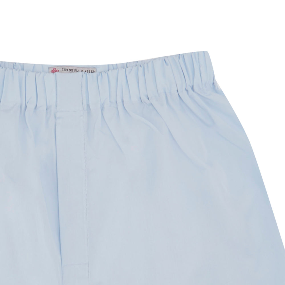 Turnbull & Asser Light Blue Sea Island Quality Cotton Boxer Shorts, crafted from premium cotton with an elastic waistband, displayed flat on a plain white background.