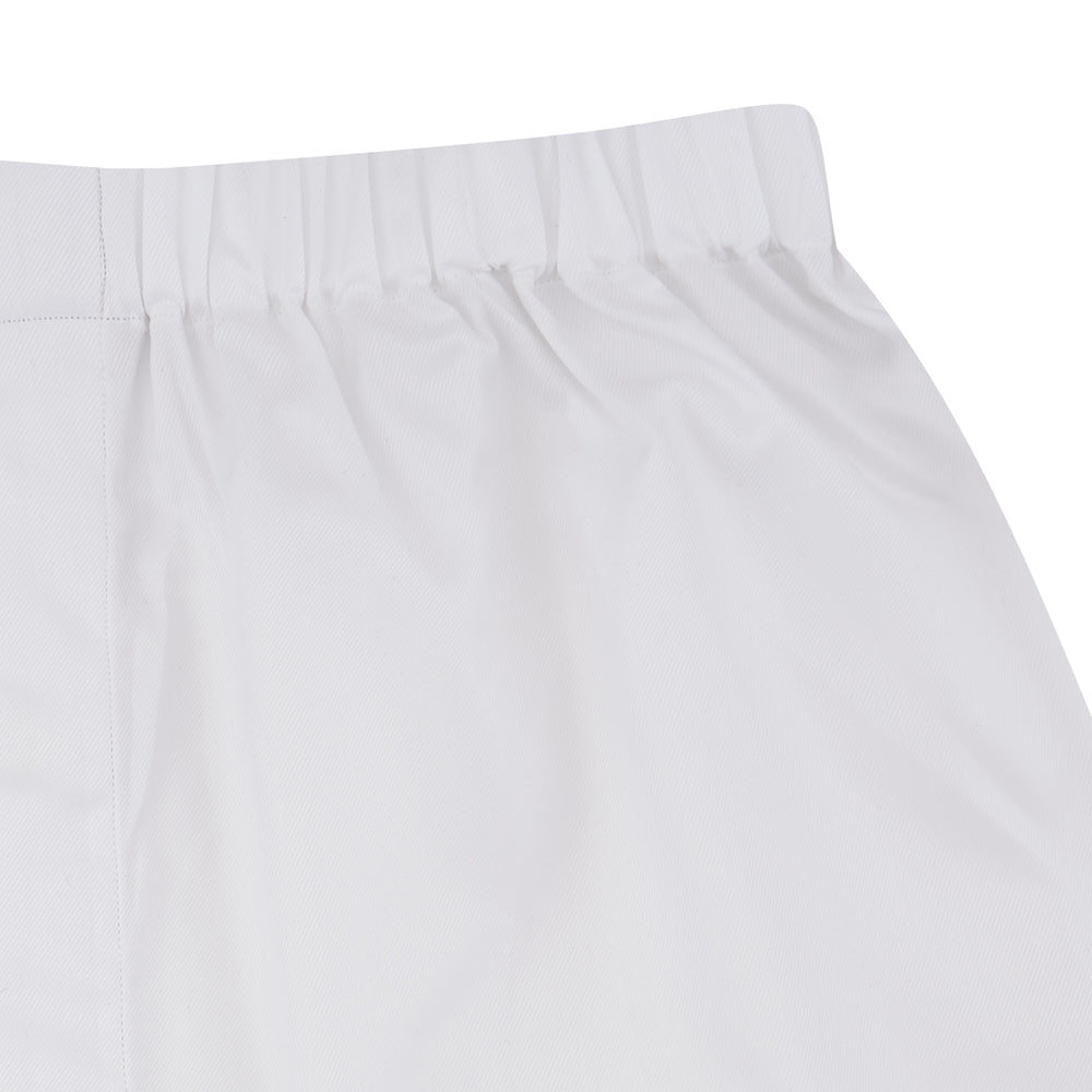Turnbull & Asser White Sea Island Quality Cotton Twill Boxer Shorts feature an elastic waistband and are photographed laid flat on a light blue background for a luxurious touch.