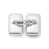 View 2 of product Turnbull & Asser's Reversible Monochrome Sterling Silver Rectangular Cufflinks feature black onyx on one side and white mother-of-pearl on the other, shown against a plain light gray background.