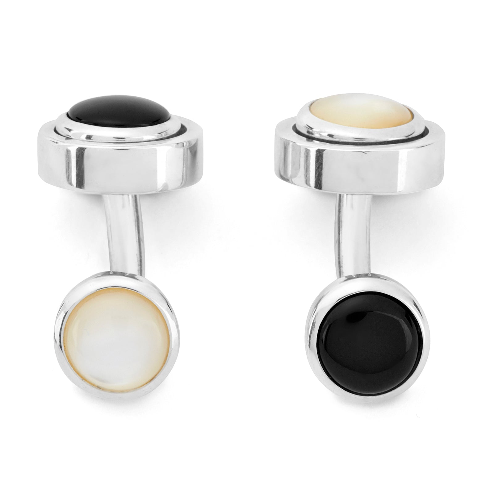 View 2 of product Turnbull & Asser’s Reversible Monochrome Sterling Silver Round Cufflinks feature elegant edges with one white mother-of-pearl center and the other a black onyx center, shown on a plain light gray background.
