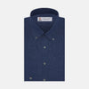 View 1 of product The Turnbull & Asser Weekend Fit Navy Linen Shirt features a Dorset collar, long sleeves with 1-button cuffs, and a button-up front, neatly folded and displayed against a plain white background.