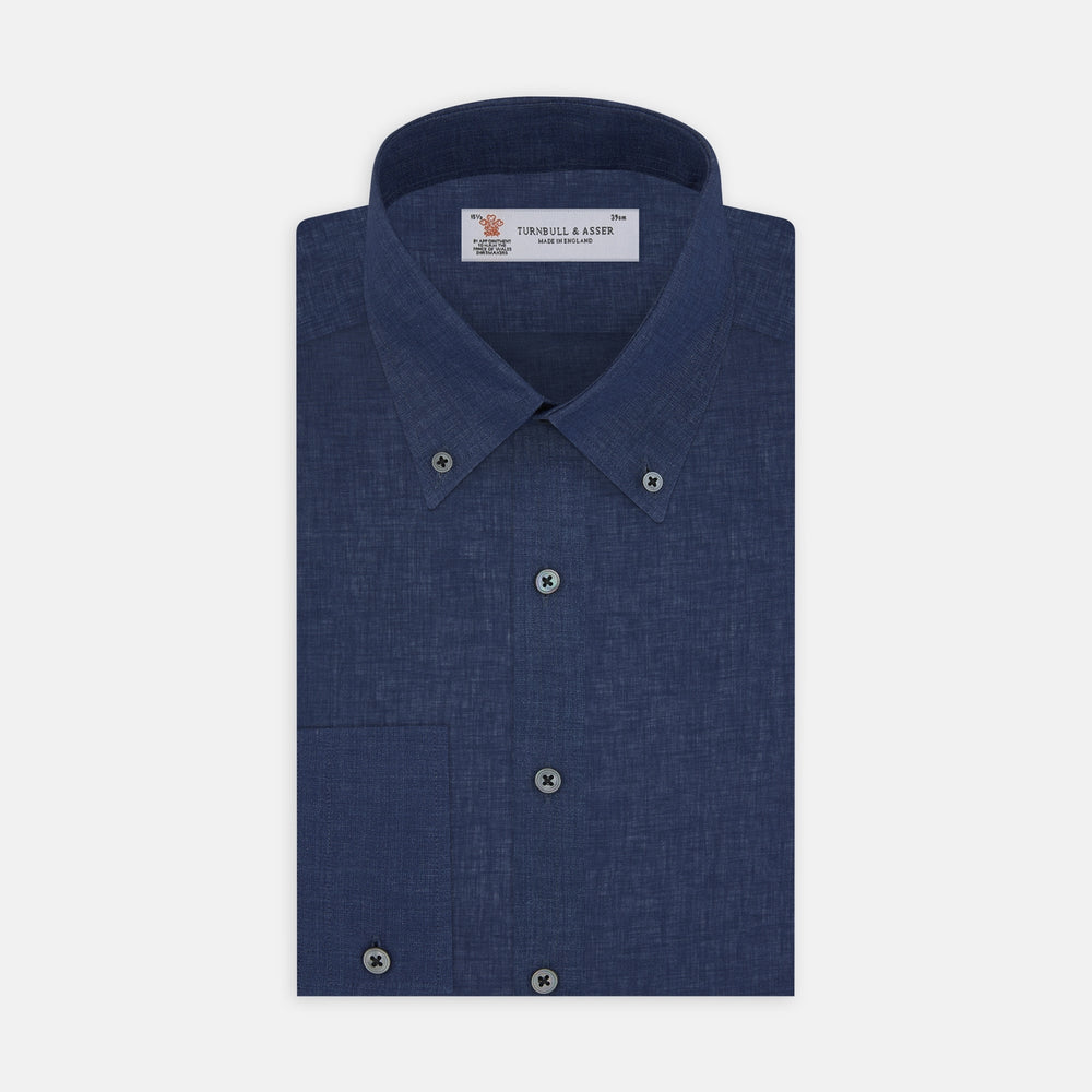 The Turnbull & Asser Weekend Fit Navy Linen Shirt features a Dorset collar, long sleeves with 1-button cuffs, and a button-up front, neatly folded and displayed against a plain white background.