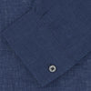 View 2 of product The Turnbull & Asser Weekend Fit Navy Linen Shirt features a Dorset collar, long sleeves with 1-button cuffs, and a button-up front, neatly folded and displayed against a plain white background.