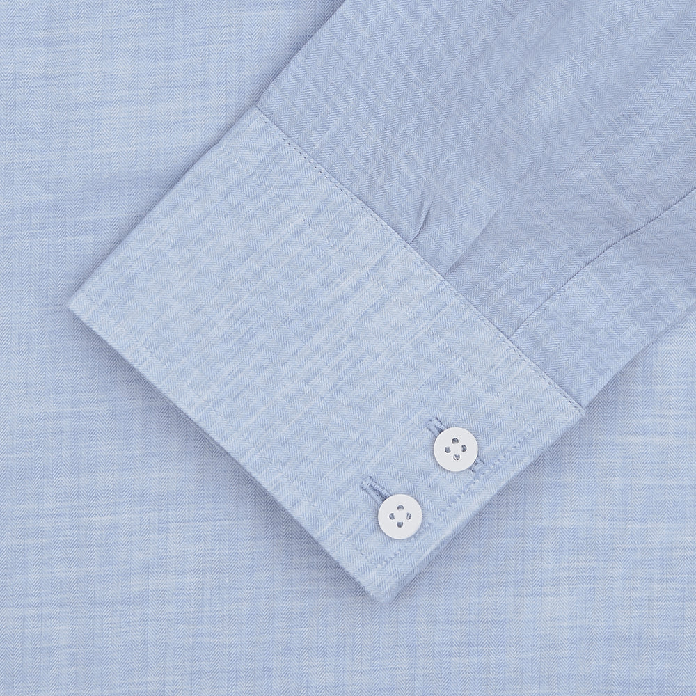 The Wine Piped Silk Pyjama Set by Turnbull & Asser, neatly folded, showcases classic piping details and a luxurious silk finish, presented against a plain white background.