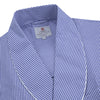 View 2 of product The Turnbull & Asser Mid Blue Gingham Check Piped Cotton Gown, featuring a shawl collar and tied belt, is elegantly displayed against a white background.