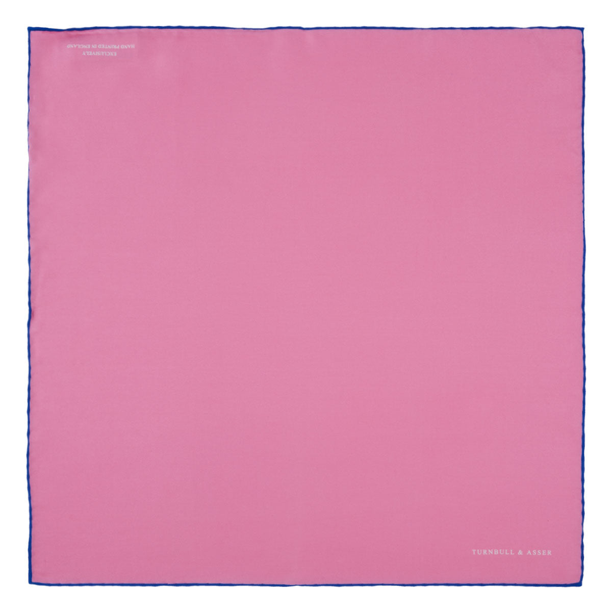 View 2 of product The Rose and Navy Piped Silk Pocket Square by Turnbull & Asser features classic pink silk with navy edging, neatly folded to display both sides. Turnbull & Asser’s logo appears in white on the lower right corner for a refined finish.