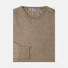 View 1 of product The Camel Fine Merino Crewneck Jumper by Turnbull & Asser is a light brown Scottish knitwear piece with a ribbed collar and cuffs, neatly displayed on a plain white background.
