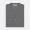 View 1 of product The Flannel Grey Merino Wool Cardigan by Turnbull & Asser features a light grey flannel finish, V-neck, ribbed cuffs, and button-up front—crafted for timeless style and comfort.