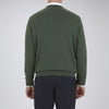 View 3 of product The Turnbull & Asser Green Crew Neck Cashmere Jumper, crafted from luxurious Scottish cashmere with ribbed cuffs, is neatly folded and displayed on a plain white background with the brand label visible inside the neckline.