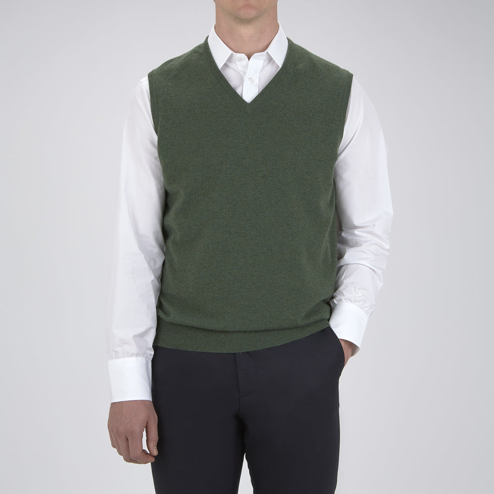 The Turnbull & Asser Green V-Neck Cashmere Slipover is neatly folded with the brand and size tag visible, displayed flat on a plain white background.