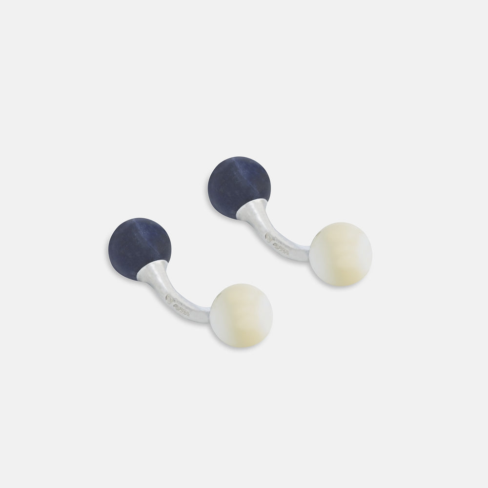 Turnbull & Asser Reversible Navy and White Bulb Sterling Silver Cufflinks feature curved silver stems with one navy and one mother-of-pearl round end per cufflink—an elegant black tie accessory, shown on a plain white background.