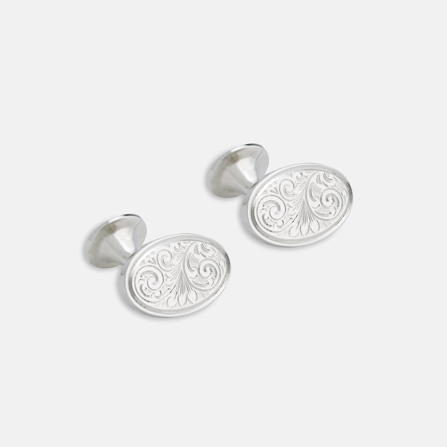 View 1 of product The Turnbull & Asser STERLING SILVER ART CUFFLINKS have oval faces with an engraved swirl pattern, finished elegantly against a plain white background.