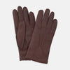 View 1 of product Turnbull & Asser’s Brown Hairsheep Leather Gloves, featuring visible stitching and decorative raised seams on the back, are displayed overlapping each other against a white background.