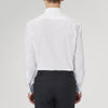 View 3 of product The Turnbull & Asser White Superfine Oxford Cotton Shirt features a T&A collar, double cuffs, and a left chest pocket. Displayed on a light gray background, it includes a visible label inside the collar—ideal for smart evening wear.